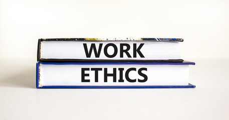 Work ethics symbol. Concept words Work ethics on beautiful books. Beautiful white table white background. Business and Work ethics concept. Copy space.