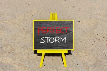 Perfect storm symbol. Concept words Perfect storm on beautiful black chalk blackboard on a...