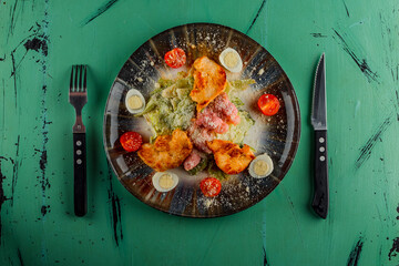 caesar salad on green table