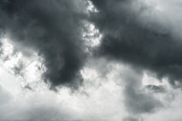 dark clouds make sky in black. Heavy rain thunderstorm . Pattern of clouds overcast predict tornado, Hurricane or thunderstorm and rainy.