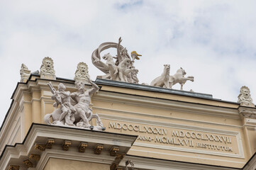 The facade of the Odessa Opera House, sculptural compositions on the facade of the theater with Roman numerals - the date of construction of the theater