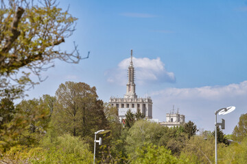 Obraz premium House of the Free Press (Romanian: Casa Presei Libere) view from the Herăstrău park in a spring day.