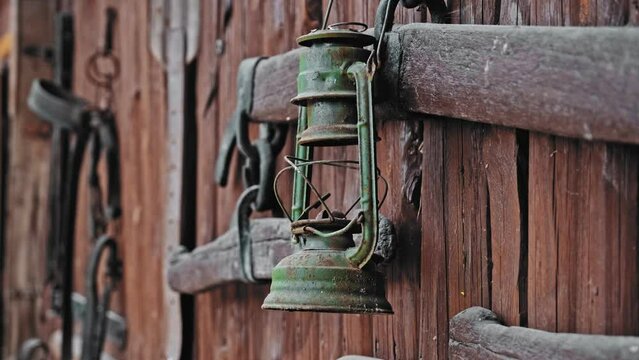 Vintage Oil Lamp Lantern Hanging on Barn Door