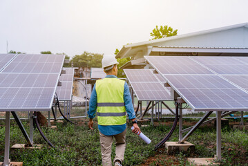 Engineer technician checking and operating system of solar cell farm power plant ,Solar station...