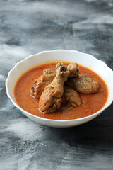 Chicken Curry is Chicken Meat in Turmeric and Coconut Milk Soup.