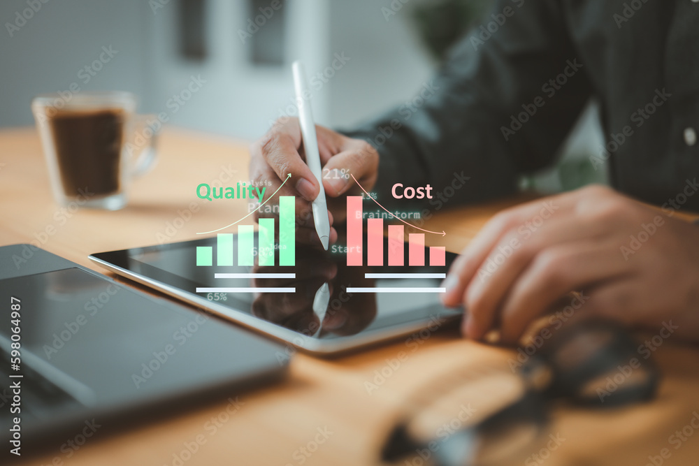 Fototapete businessman uses a tablet to manage cost and quality control, importance of effective business strat