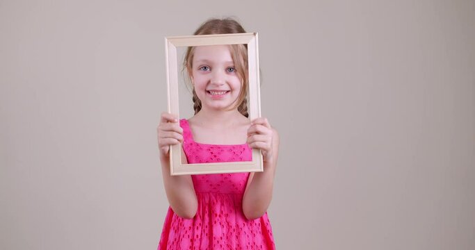 Little Kid Girl With Photo Frame