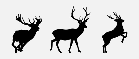 isolated black silhouette of a deer , vector collection