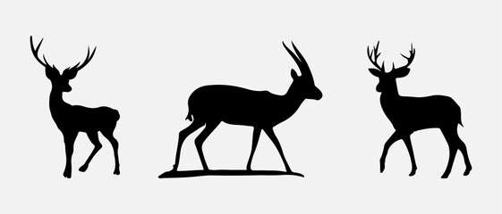 isolated black silhouette of a deer , vector collection