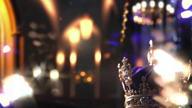 A gold royal king queen coronation crown with jewels and diamonds against a blurred gothic cathedral background with looped crystal and glass light leaks overlays. A.I. generated background image.