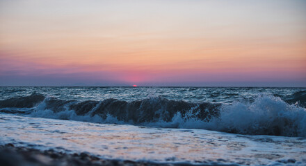 Sunset over Mediterranean Sea seen from a beach at Rhodes island