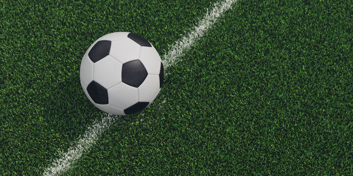 3D Traditional soccer ball on the line on field on a 3D Soccer Stadium