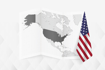 A grayscale map of USA with a hanging American flag on one side. Vector map for many types of news.