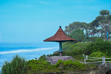 Pangandaran Beach (Shark Rock) a tourist attraction with views of the waves and cliffs, April 23, 2023 West Java Indonesia