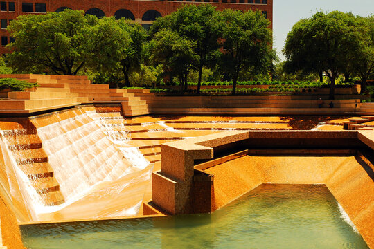 The Water Garden in Downtown Ft Worth Texas offers a cascading man made waterfalls over stone levels in a town plaza