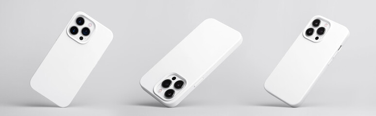 set of three iPhone 14 and 13 Pro Max in white silicone case falling down in different angles, back view isolated on grey background, phone case mockup