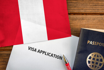 Fototapeta na wymiar Visa application form, passport and flag of Peru 