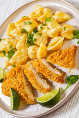 breaded chicken fillet with alfredo pasta shells
