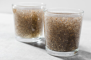 Water with Chia Seeds, Healthy Drink on Bright Background