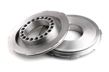 hydraulic clutch piston isolated on white background. new metal car part.