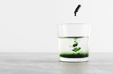 Liquid Chlorophyll in a Glass of Water, Superfood, Healthy Eating, Detox Concept