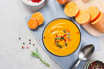 Sweet Potato Soup, Fresh Homemade Pumpkin, Sweet Potato, Carrot Soup in a Bowl on Bright Background