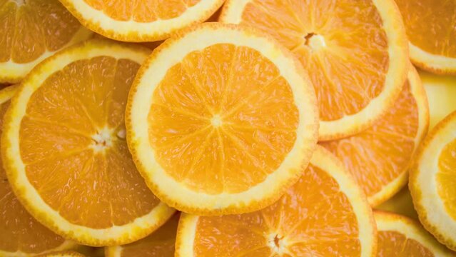 Fresh juicy orange, cut into slices. orange background. Healthy refreshing fruit. Vitamins and Health Generative AI
