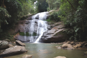 Fototapeta premium National Park, beautiful waterfall view. Concept of green tourism and summer ecotourism. Generative Ai content. Generative AI