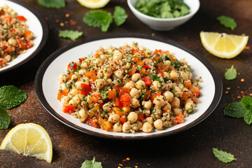 Chickpea Salad with Quinoa, sweet red pepper, herbs and lemon. Healthy food