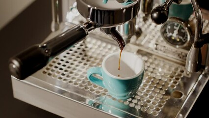 The Art of Coffee-Making: A 4K Video of a Professional Barista Crafting the Perfect Espresso with a Portafilter Machine