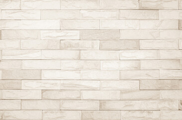 Cream and white brick wall texture background. Brickwork and stonework flooring interior rock old pattern design.	