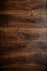 Naklejka premium Close-up of a large dark walnut wood table surface showcasing its natural wood grain and texture