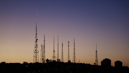 Purple sunset over the transmission towers