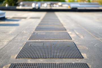 Photo roof protection pad on a new EPDM on a large commercial building © Thomas