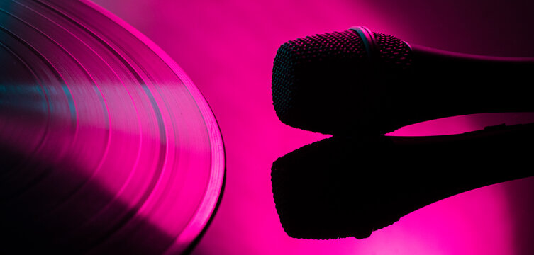 colored music background banner with microphone and vinyl record silhouettes.sound voice music show podcast disco dj karaoke concept
