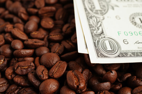 US dollar banknotes on coffee beans, shopping online for export or import.