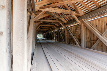 Historic Hamden timber covered bridge in the Hamlet of Hamden, Delaware County NY