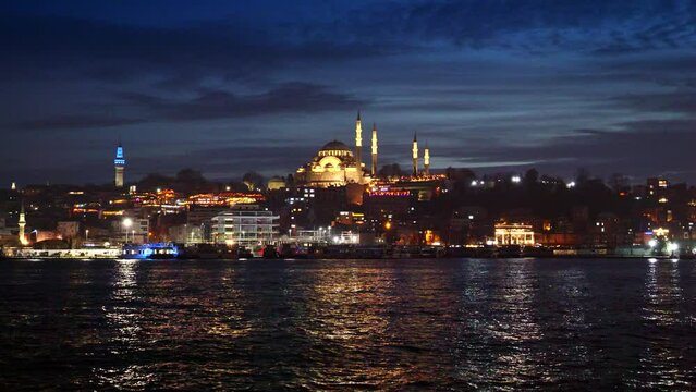 Istanbul, Turkey - February 2023: Hagia Sofia Mosque reflecting in the Bosphorus sea water at night