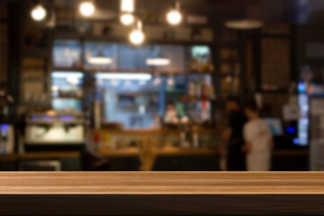 Cafe bar blurred background. Wooden table on cafe.