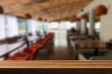 Cafe bar blurred background. Wooden table on cafe.