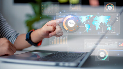 Data scientists.  a programmer using a laptop to analyze and develop various information on a futuristic virtual interface screen. Algorithm. marketing and deep learning of artificial intelligence