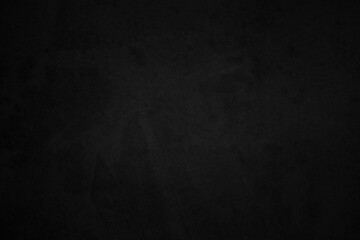 Art black concrete stone texture for background in black. Cement and sand grey dark detail covering.