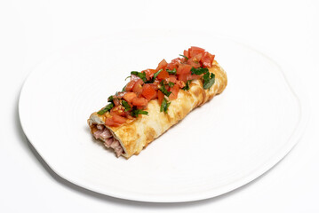 Baked bun with meat filling, decorated with tomatoes and herbs. Isolated on white background. Restaurant menu
