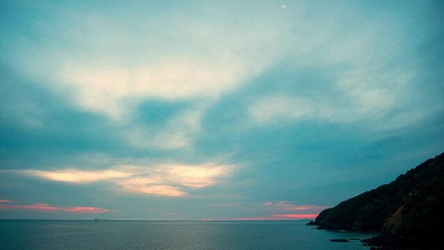 time lapse fantastic sky of sunrise at Lanta lighthouse..light house landmark of Lanta island..lighthouse is on Tanod cap the end way of Lanta Yai island build on the hill.