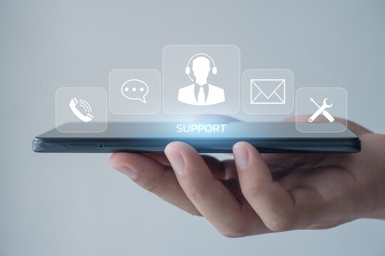 Technical Support Center Customer Service Internet Business Technology Concept. Service support customer help call center Business technology button on virtual screen. Person hand using a smartphone.
