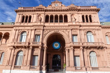 Fototapeta na wymiar Facade of Casa Rosada, Palatial Mansion and Office of the President of Argentina at Historic Plaza De Mayo in Buenos Aires