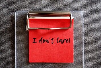 Red note with text written I DON'T CARE indicates speaker writer has no interest or emotional...