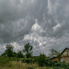 Fototapeta na wymiar Stormy skies over the suburbs