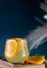 Fresh orange juice isolated on black background