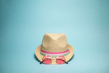 Summer hat isolated on blue background 